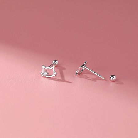 A detailed product shot of the silver cat-shaped stud earrings, showing the post and butterfly backing.