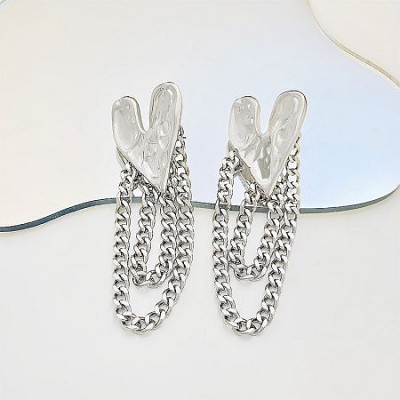 Modern silver chain earrings with distinctive clear Y-shaped tops.