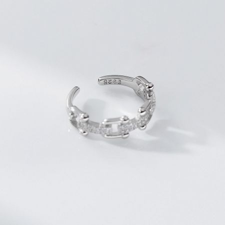 A complete view of one of the adjustable U-link rings, showcasing its polished silver finish.