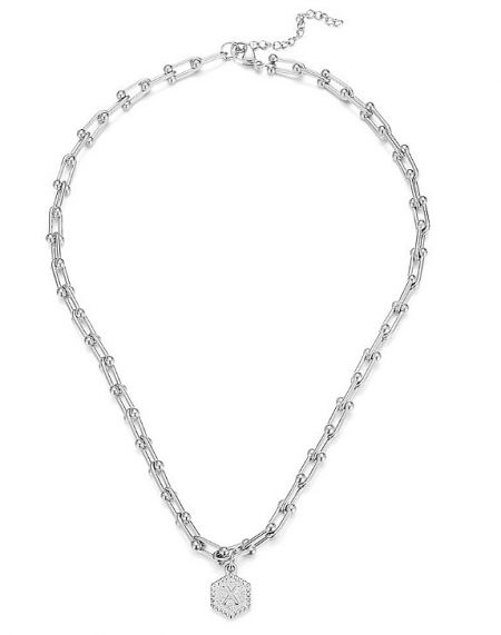 Silver plated initial letter necklace with a shield-shaped pendant.
