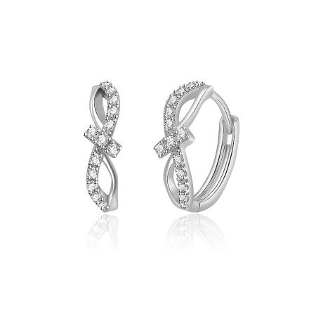 Detailed close-up of the Interlock CZ Huggie Earrings highlighting the crisscross pattern and secure hinged back closure.