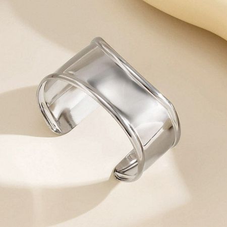 Front view of the modern silver cuff bracelet with a rectangular band.