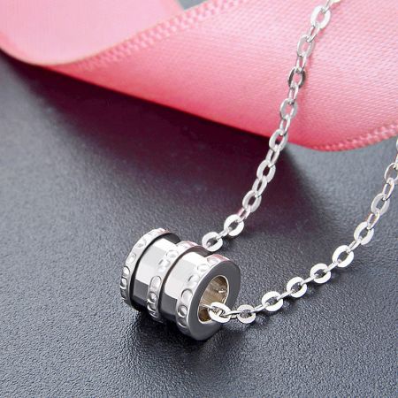 Close-up of the 925 sterling silver lucky tube bead necklace in a silver finish.