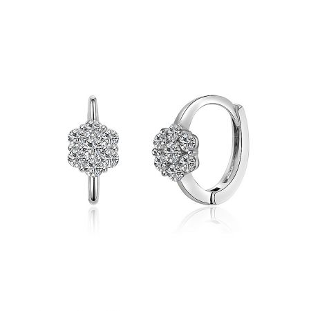 Detailed shot of the Floral Clear CZ Huggie Earrings, showing the silver base and the flower-like cluster of cubic zirconia stones.
