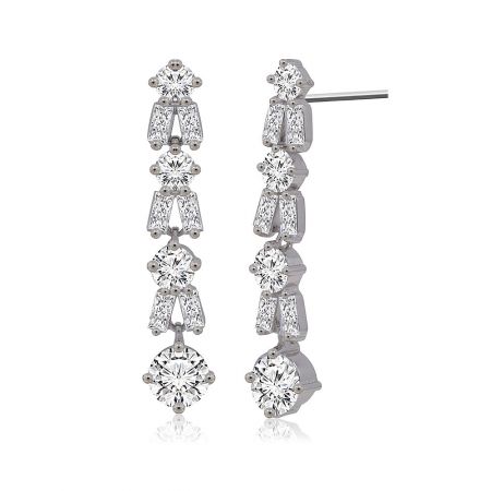 Detailed view of the brilliant cut zirconia earrings, highlighting the linear multi-section design with round and baguette-cut gemstones.
