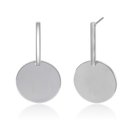 Detailed shot of the silver drop earrings, highlighting the sleek post closure and polished lines.
