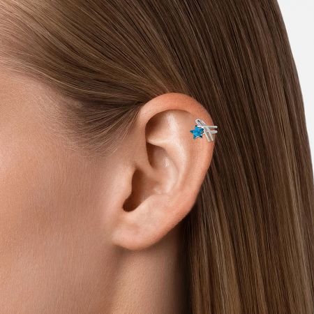 Model wearing the Blue Star Shaped Ear Cuff Earring to show how it fits on the ear.