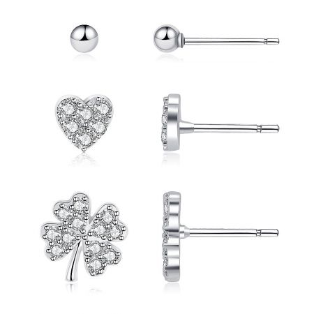 Detailed view of the three earring pairs: ball, heart, and clover, showing front and side profiles.