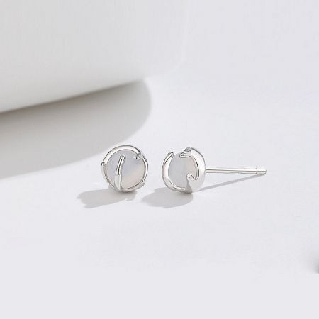 Product photo of the 925 sterling silver stud earrings with white agate against a clean white background.