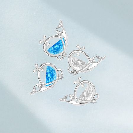 925 Sterling Silver Sea Starfish Huggie Hoop Earrings (Set of 5 Pairs) - A promotional display of the 925 Sterling Silver Sea Starfish Huggie Hoop Earrings set, showcasing multiple pairs with blue and white gemstones.
