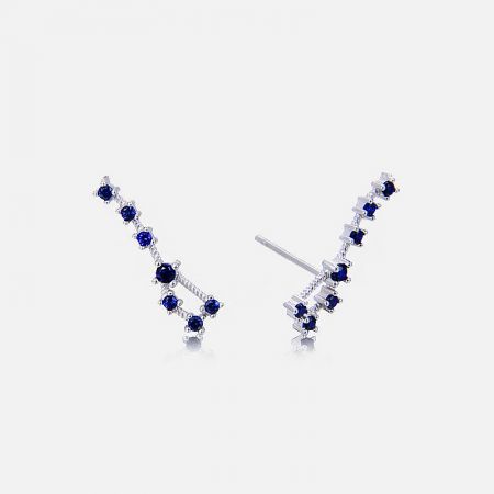 Detailed view of the blue CZ stone Big Dipper stud earrings, showcasing the intricate seven-star design.