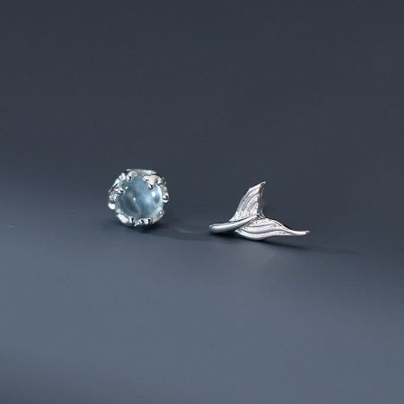 925 Sterling Silver Mermaid Tail Asymmetrical Stud Earrings Set of 5 - A pair of 925 sterling silver asymmetrical stud earrings, one featuring a whimsical mermaid tail design and the other a sparkling light blue gemstone.