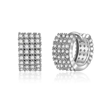 Close-up shot of the Dazzling Clear CZ Cluster Huggie Earrings on a neutral background.