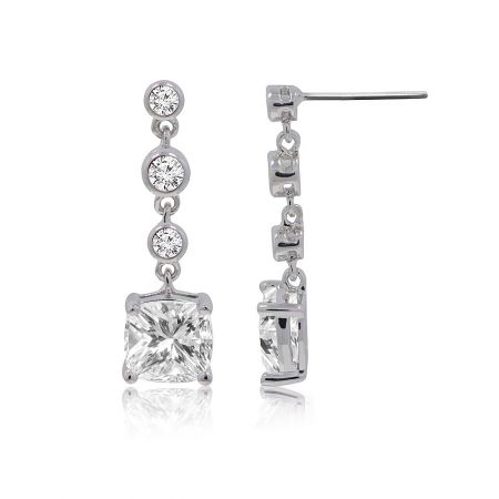 Close-up detail of the silver drop earrings, highlighting the precision-cut facets of the large square and smaller round cubic zirconia stones.