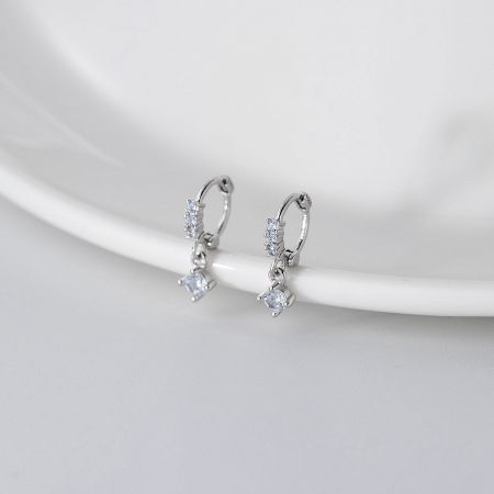 Sterling Silver Geometric Square Zirconia Earrings (5 Pairs) - A pair of sterling silver geometric square zirconia earrings with a minimalist design, displayed on a clean white background to highlight their sparkling stones.