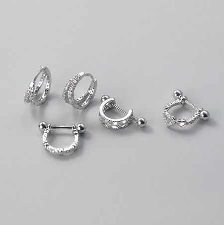 925 Sterling Silver CZ Hoop Earring In Different Designs - A collection of 925 Sterling Silver CZ Hoop Earrings in various elegant designs, featuring sparkling cubic zirconia stones.