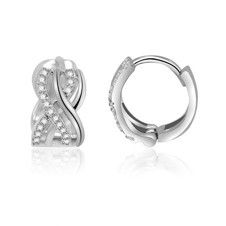 A pair of Inter Cross Clear CZ Huggie Earrings shown with another hoop style to demonstrate versatility.
