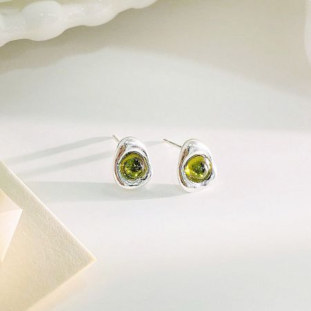 A pair of sterling silver stud earrings featuring beautiful green opal gemstones.