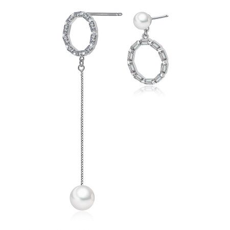 Detailed shot of the silver-toned earrings, highlighting the dangling pearl on a chain and the arrangement of gemstones.