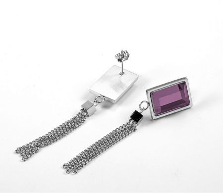 A pair of silver stud earrings with purple gemstones and matching chain tassels.