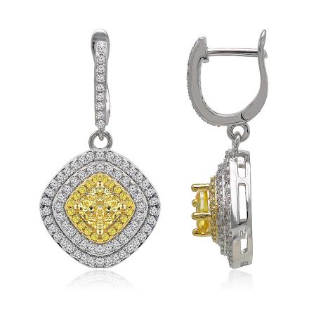 Close-up detail of the two-tone cushion shape stud earring, highlighting the yellow and white diamond accents and lever-back clasp.
