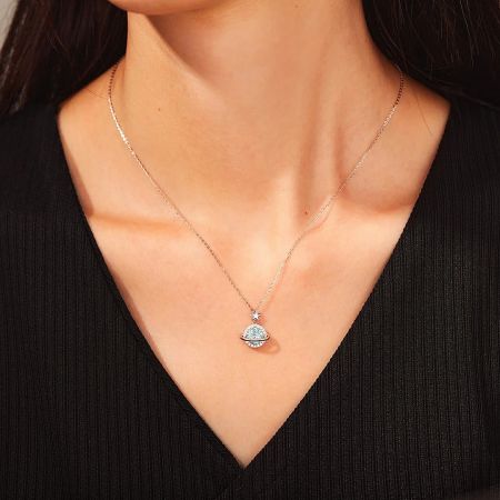 Another angle of the sterling silver necklace, highlighting the sparkle of the zircon stones.