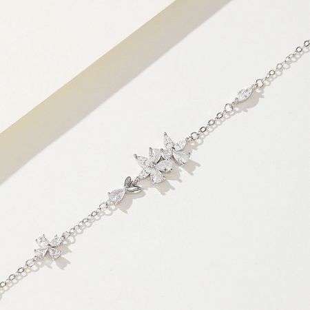 The sterling silver floral bracelet shimmering with high-quality crystal zircon stones.