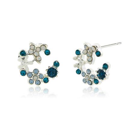 A detailed view of the floral stud earrings, highlighting the blue and white enamel and crystal gemstones set in silver.