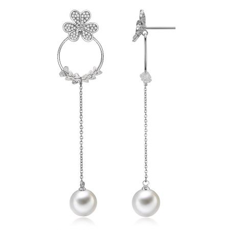 Close-up view of the Clover Shape Long Earrings, highlighting the intricate floral design with sparkling cubic zirconia and a large white pearl.