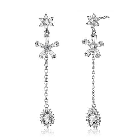 Close-up shot of the chandelier earrings, highlighting the floral starburst pattern and the exceptional clarity of the AAA-grade stones.