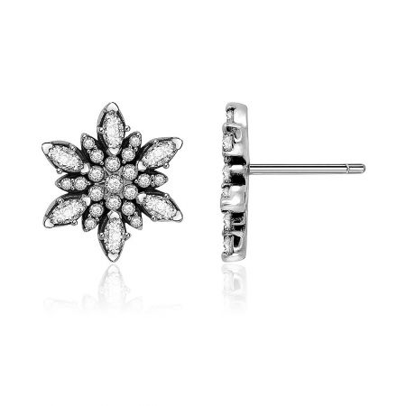 Side view of the silver flower stud earrings showcasing the clear cubic zirconia gemstones.