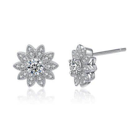 Another angle of the silver sunflower-shaped stud earring, highlighting the brilliance of the cubic zirconia stones.