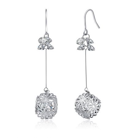 Side profile of the Daisy Drop earrings showing the floral top and elegant dangle form.