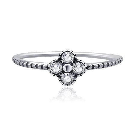 Four Petals Tiny Flower 925 Sterling Silver CZ Ring - Close-up of the Four Petals Tiny Flower Ring in 925 sterling silver, showcasing the intricate flower-shaped cubic zirconia setting.