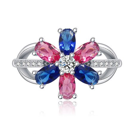 Flower Double Color Cubic Zirconia Band Ring - Flower Double Color Cubic Zirconia Band Ring featuring a floral design with a central white CZ, surrounded by pink and blue gemstones on a rhodium-plated band with accent stones.