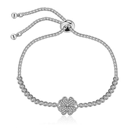 Clover Charms Wish Me Luck Bracelet - The Clover Charms Wish Me Luck Bracelet featuring a silver-toned four-leaf clover charm set with sparkling cubic zirconia stones and an adjustable drawstring closure.
