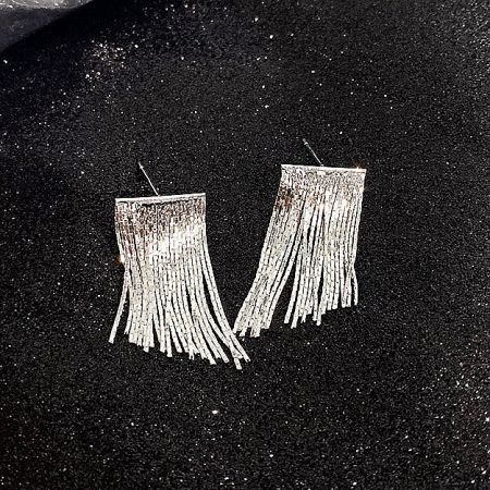A stylish product shot of the pair of silver fringe earrings.
