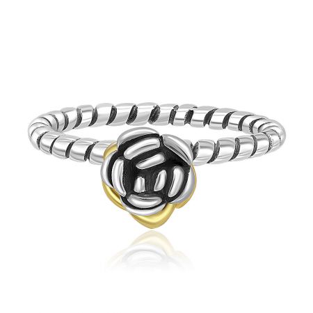 Two Tone Rose Twist Band Reminder Ring - A close-up of the Two Tone Rose Twist Band Reminder Ring, showcasing its intricate flower-inspired design in 925 sterling silver with gold plating.