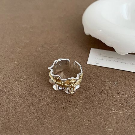 Another angle of the minimalist statement bow ring, showing its adjustable band.