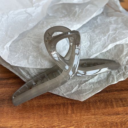 Grey acetate hair jaw clip with French design.