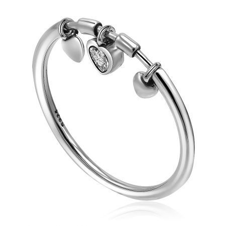 Side view of the silver heart charm bracelet, highlighting the gemstone-studded charm.