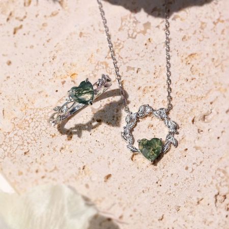 Heart of Nature: Green Zircon Heart 925 Sterling Silver Ring Set of 5 - A beautiful set of Heart of Nature sterling silver jewelry, featuring rings with heart-shaped green zircon gemstones in a silver leaf design.