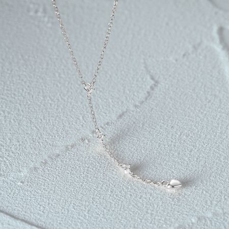 925 Sterling Silver Y-Shaped Heart Charm Drop Necklace (Set of 5) - A close-up of the 925 sterling silver Y-shaped necklace, highlighting its minimalist design and distinctive heart-shaped charm clasp.