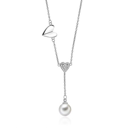 Detailed view of the dual heart design with a pearl pendant on the rhodium tone necklace.