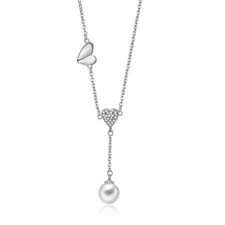 Close-up of the smooth and cubic zirconia encrusted heart shapes with the white glass pearl.