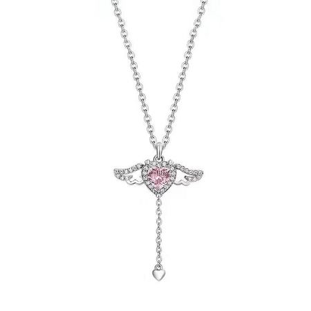 Angled shot of the heart necklace showcasing the vibrant pink gemstone.