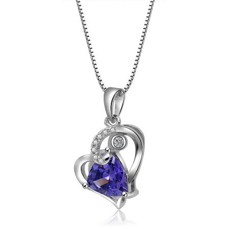 Detailed shot of the Heart Connect Necklace pendant, highlighting the brilliant purple gemstone and surrounding smaller diamonds.