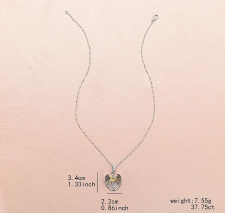 Detailed view of the silver heart-shaped angel wing pendant.