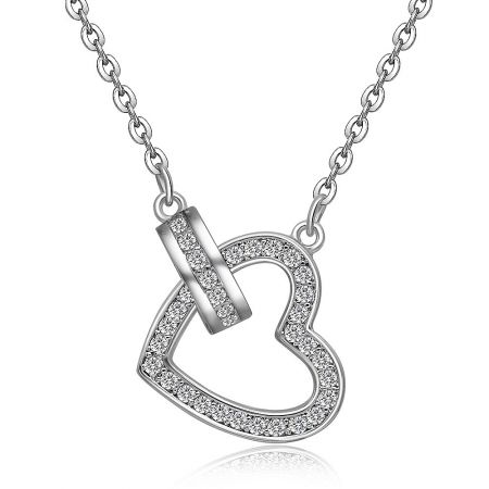 Detailed shot of the silver heart pendant necklace, emphasizing the brilliance of the cubic zirconia details.