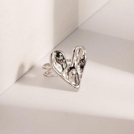 Stainless Steel Hammered Grain Heart Open Adjustable Rings (Set of 5) - A close-up of a silver stainless steel ring with a hammered texture, featuring an open heart design on a white background.